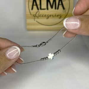 Pulsera con cruz del equilibrio